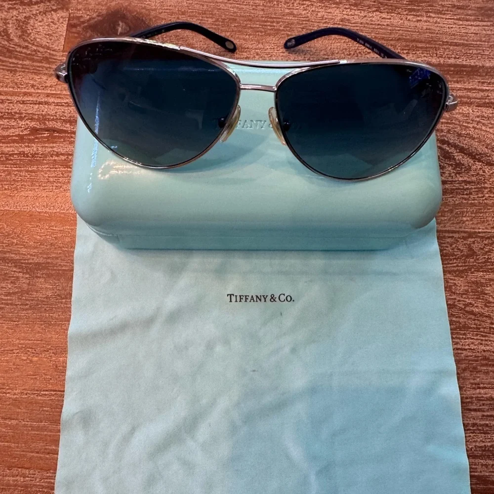 Tiffany aviator blue sunglasses. Slightly used good condition.
